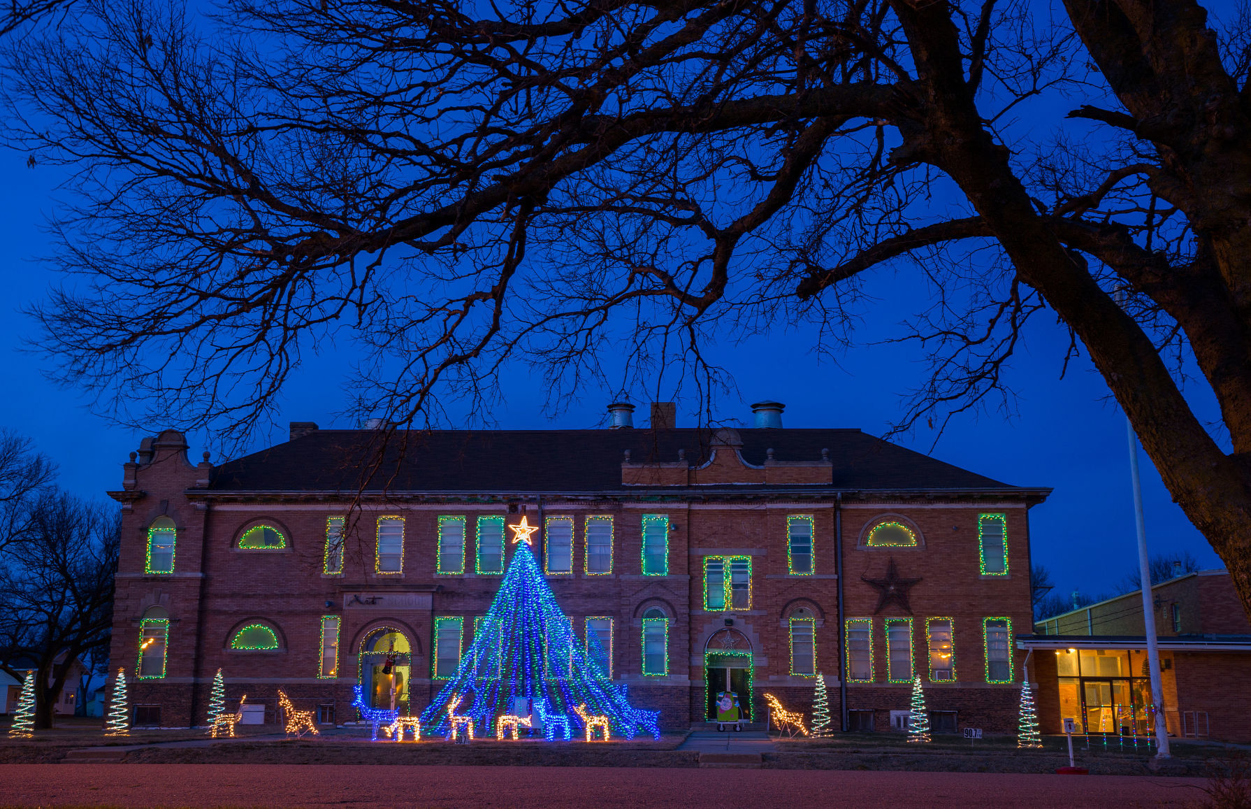 A 32-feet-high tree made from strands of lights holiday lights on display at a schoolhouse in Chester, Nebraska.